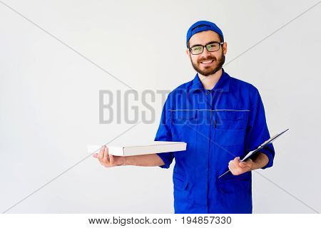 Pizza delivery service concept: delivery guy bringing pizza box