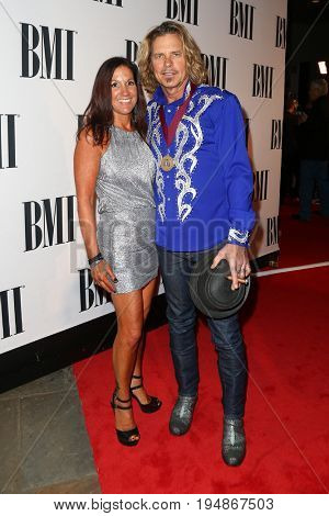 NASHVILLE, TN-NOV 3: Recording artist Jeffrey Steele (R) and wife Stephanie LeVasseur attend the 63rd annual BMI Country awards at BMI on November 3, 2015 in Nashville, Tennessee.