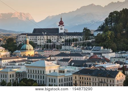 Salzburg skyline with Nonnberg Abbey monastery at sunset