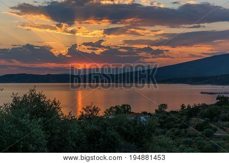 Beautiful sunset in Greek Island Thasos with dramatic clouds