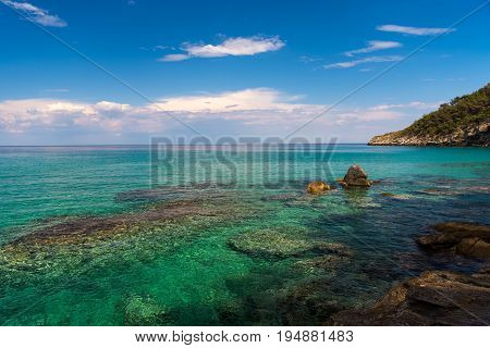 Amazing turquise water on the coast of the beautiful greek island Thasos