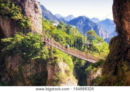 The Fangdong suspension bridge spanning a sheer cliff in the yandangshan scenic area in Zhejiang province China.