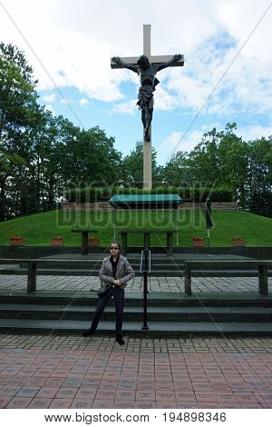 INDIAN RIVER, MICHIGAN / UNITED STATES - JUNE 18, 2017: The Cross in the Woods Roman Catholic National Shrine features the world's largest crucifix.
