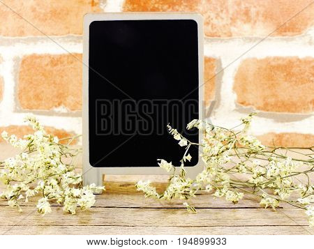 space of wooden background with flower bouquet decoration