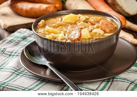Traditional Polish Split Pea Soup With Sausage, Bacon And Potatoes