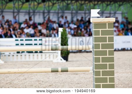 TURDA, CLUJ, ROMANIA - JUNE 29, 2017: An unidentified competitor jumps with his horse at the Salina Equines Horse Trophy , June 29, 2017 in Turda, Cluj, Romania