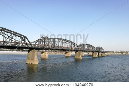 Broken Bridge, Dandong, China (April, 2017) - opposite to Sinuiju city, North Korea; at Yalu river (natural border). It was bombed; repaired only part in China. Taken from public area in China.