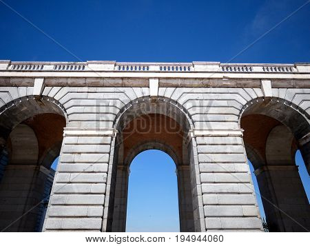 Close-up corridor archway at Palacio Real de Madrid or Royal Palace of Madrid in Spain.