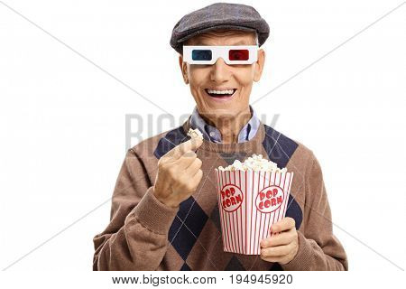 Senior wearing a pair of 3D glasses and having popcorn isolated on white background