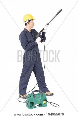 Young Man Stand And Holding High Pressure Water Gun
