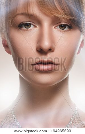 Portrait of young attractive woman smoky effect