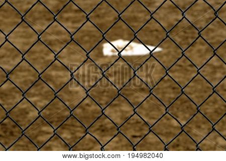 Baseball home plae and backstop chainlink fence wire