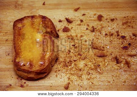 Bread Crumbs Around Honey On Toasted Bread, Bread Crumbs Around Honey On Toasted Bread