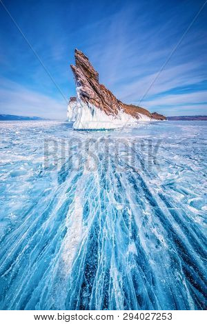 Tail Of Ogoi Island With Natural Breaking Ice In Frozen Water At Lake Baikal, Siberia, Russia.