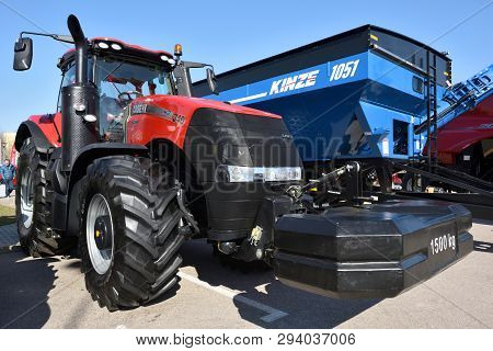 Kaunas, Lithuania - April 04: Case Ih Tractor And Brand Logo In Kaunas On April 04, 2019. Case Ih Is