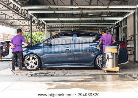 Cleaning The Car (car Detailing) At Car Care Shop