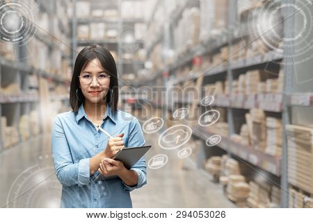Portrait Of Happy Young Attractive Asian Entrepreneur Woman Looking At Camera Using Smart Tablet In 