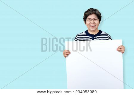 Happy Grandma Smiling With White Teeth, Enjoy Moment And Holding A Blank Board. Asian Older Woman Sh