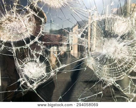 The Texture Of The Broken Cracked Thick Fragile Broken Sharp Glass, Triplex With Shiny Small Fragmen