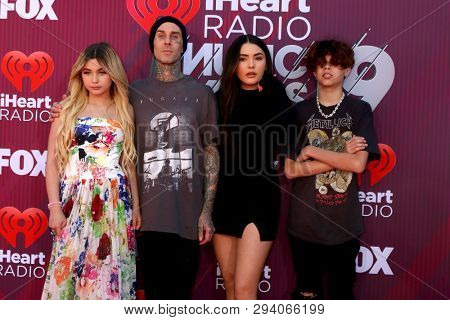LOS ANGELES - MAR 14:  Alabama Barker, Travis Barker, Atiana De La Hoya, Landon Barke at the iHeart Radio Music Awards - Arrivals at the Microsoft Theater on March 14, 2019 in Los Angeles, CA