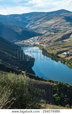 View Of The Terraced Vineyards In The Douro Valley And River Near The Village Of Pinhao, Portugal. C