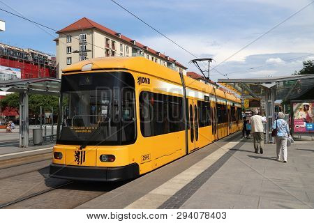 Dresden, Germany - May 10, 2018: Passengers Ride On Public Transportation Electric Tram In Dresden. 