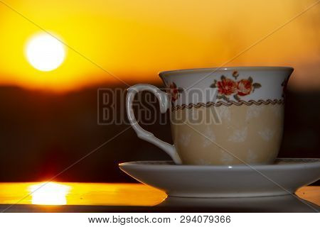 Silhouettes Of Sunrise Morning Coffee, Close Up Hot Coffee