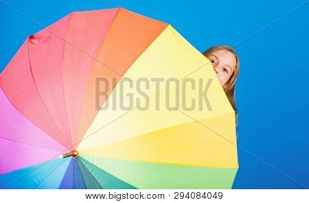 Color Your Life. Girl Cheerful Hide Behind Umbrella. Colorful Umbrella Accessory. Weather Forecast C