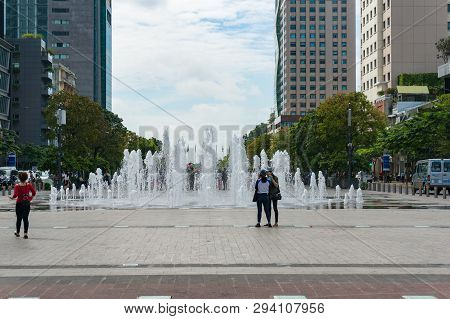 Ho Chi Minh City, Vietnam - August 24, 2017: People Near The Fountain On Nguyen Hue Walking Street I