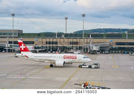 ZURICH, SWITZERLAND - CIRCA OCTOBER, 2018: an Swiss aircraft on pushback at Zurich International Airport.