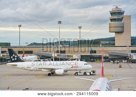 ZURICH, SWITZERLAND - CIRCA OCTOBER, 2018: an Swiss aircraft on pushback at Zurich International Airport.