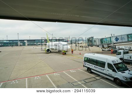 ZURICH, SWITZERLAND - CIRCA OCTOBER, 2018: an AirBaltic aircraft seen from Zurich International Airport terminal.
