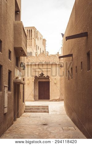Narrow Street In Old Dubai, Traditional Arab Architecture.