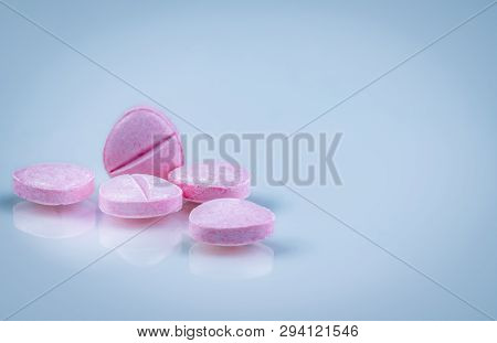 Pink Tablets Pills With Shadow On Gradient Background. Pharmaceutical Industry. Pharmacy Products. V