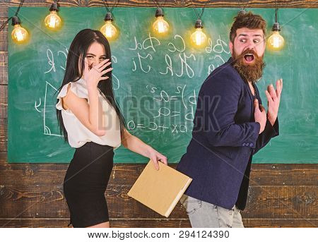 Role Games Concept. Student Lady Slapping On Teachers Buttocks With Book. Girl On Smiling Face Havin