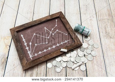 Chalkboard Charts And Russian Money. Business Still-life