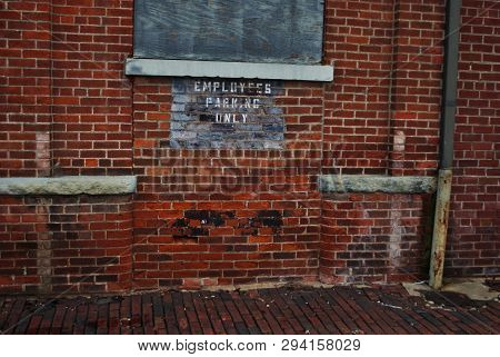 Abandoned Brick Train Depot With Tracks And Graffiti