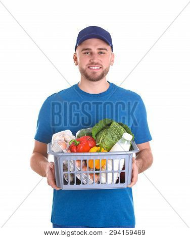 Delivery Man Holding Plastic Crate With Food Products On White Background