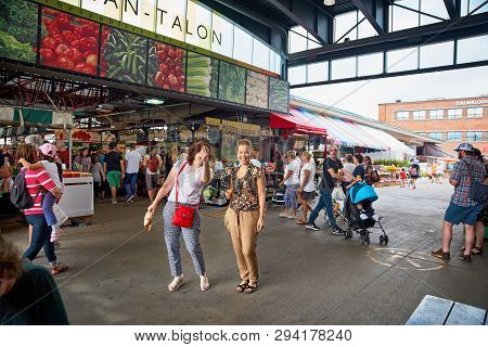 Montreal, Quebec, Canada September 29, 2018: Two Women At The Jean -talon Farmers Market. Joyful Mar