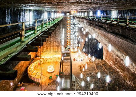 TURDA, ROMANIA - MARCH 10, 2018: Turda Salt Mine or Salina Turda, well known landmark in Transylvania with an underground museum and theme park, Romania, Europe