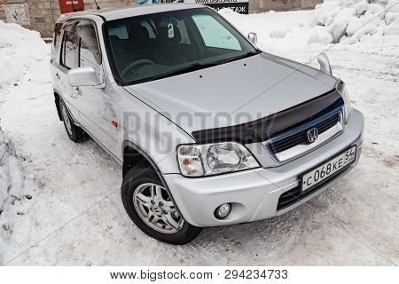 Novosibirsk, Russia - 03.10.2019: Front View Of Honda Cr-v First Generation In Silver Color After Cl