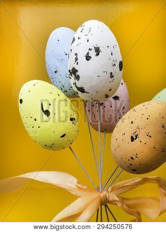 Bouqued From Color Easter Eggs On Orange Background, Copy Space