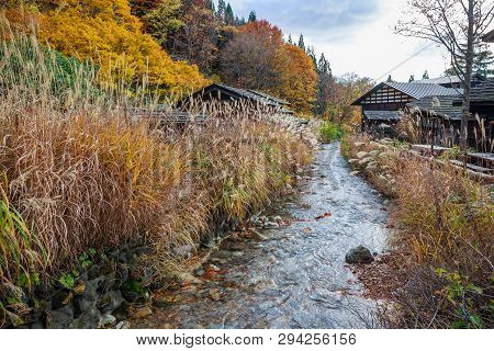 Wooden Huts Among The Forrest In Autumn, Tsuru-no-yu Onsen - Senboku, Akita, Japan