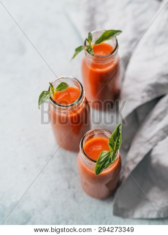 Delicious Gaspacho Soup In Glass Bottles. Traditional Spanish Cold Soup Puree Gaspacho Or Gazpacho O