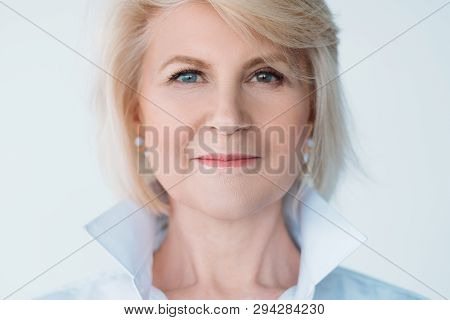 Senior Woman Beauty. Aged Lady Portrait. Female Looking At Camera. Natural Makeup. Heterochromia. Fa