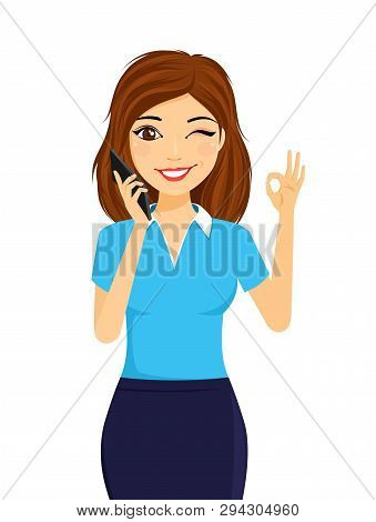 Portrait Of A Young Girl With A Mobile Phone. The Girl Holds A Mobile Phone In Her Hand And Winks. F