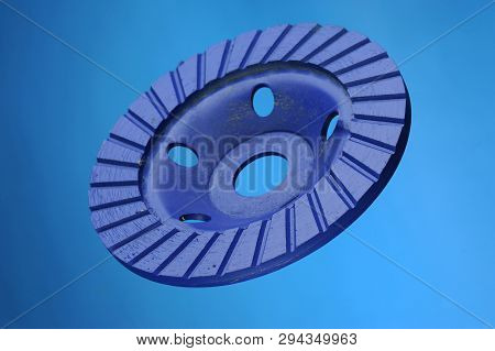 Abrasive Wheel Isolated On White Background. Grinder Disc On The Blue Background