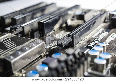 Zelenodolsk, Ukraine. 5.01.2019. The Old Motherboard From The Computer Of Blue Color. Texture. Spare
