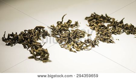 Inscription Tea From Green Tea Leaves On A White Background