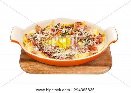Breakfast. Scrambled Eggs With Bacon, Meat, Grated Parmesan Cheese, In Ceramic Ware, On A Wooden Sta